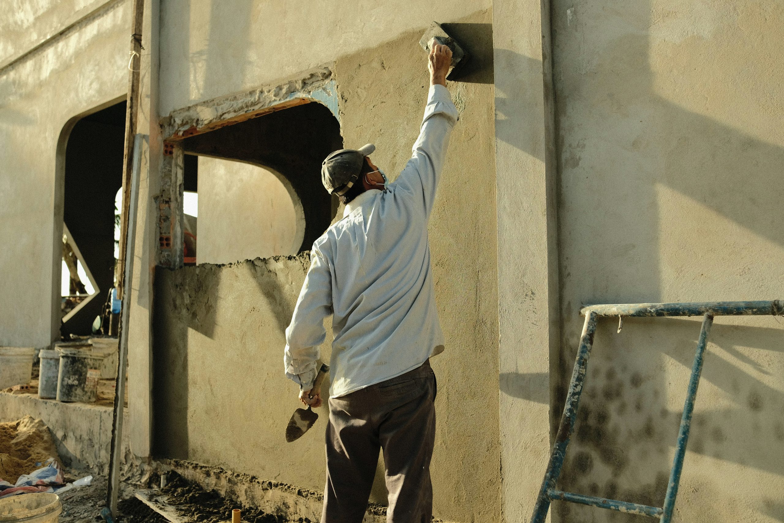 Foundation Wall Repair Boise Idaho contractor installing carbon fiber reinforcement on a cracked basement wall