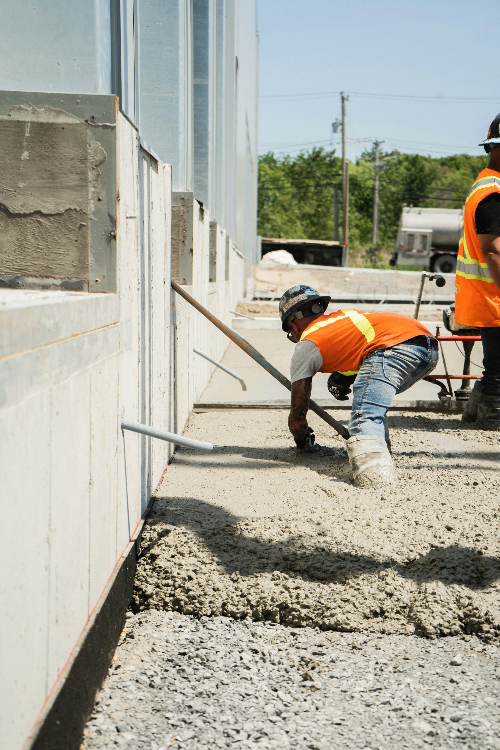 Foundation Underpinning Boise Idaho contractor installing helical piers beneath a settling residential foundation